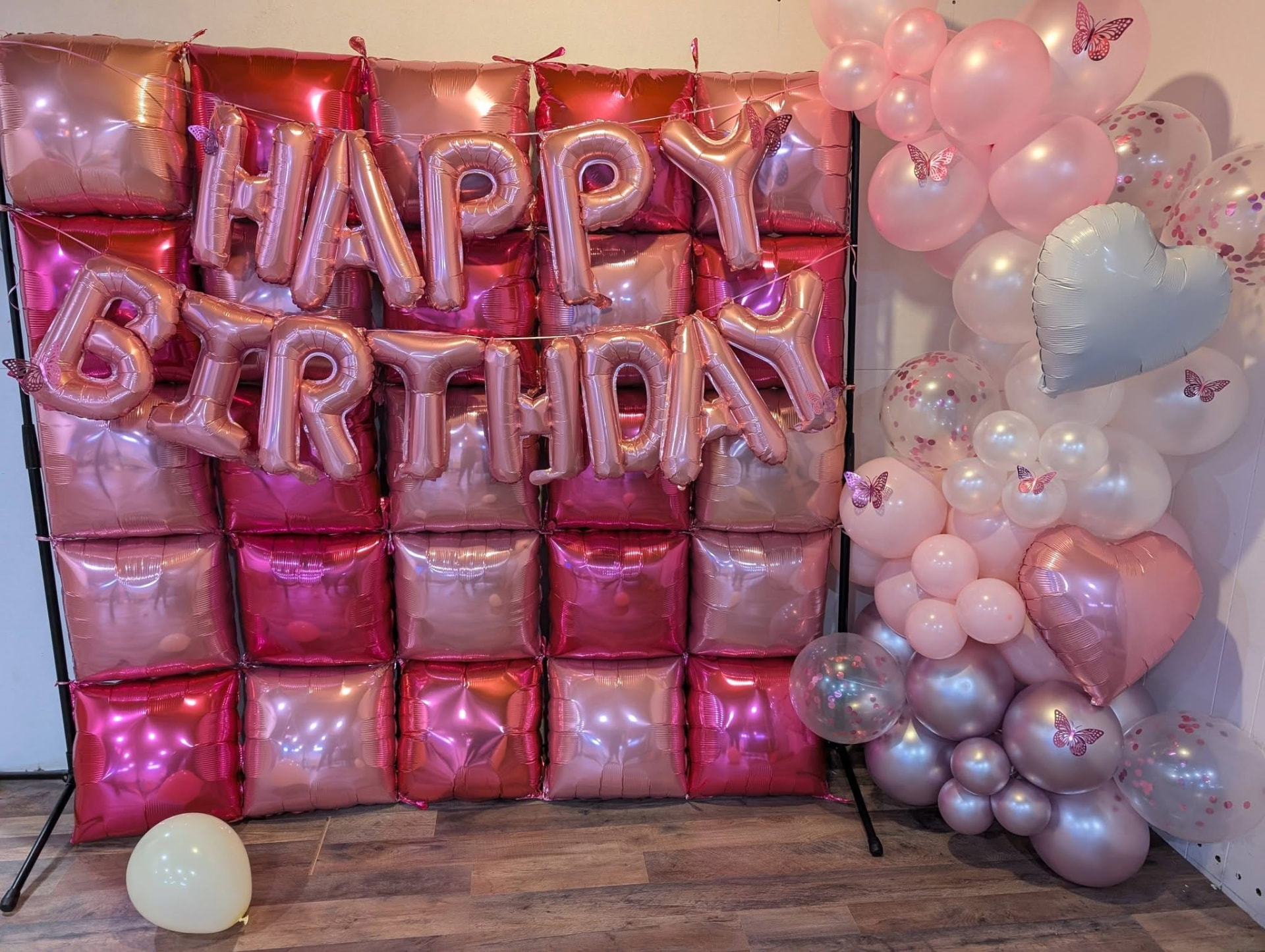 Pink foil square balloon wall with rose gold birthday letters